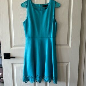 Blue A-line dress with scalloped edges